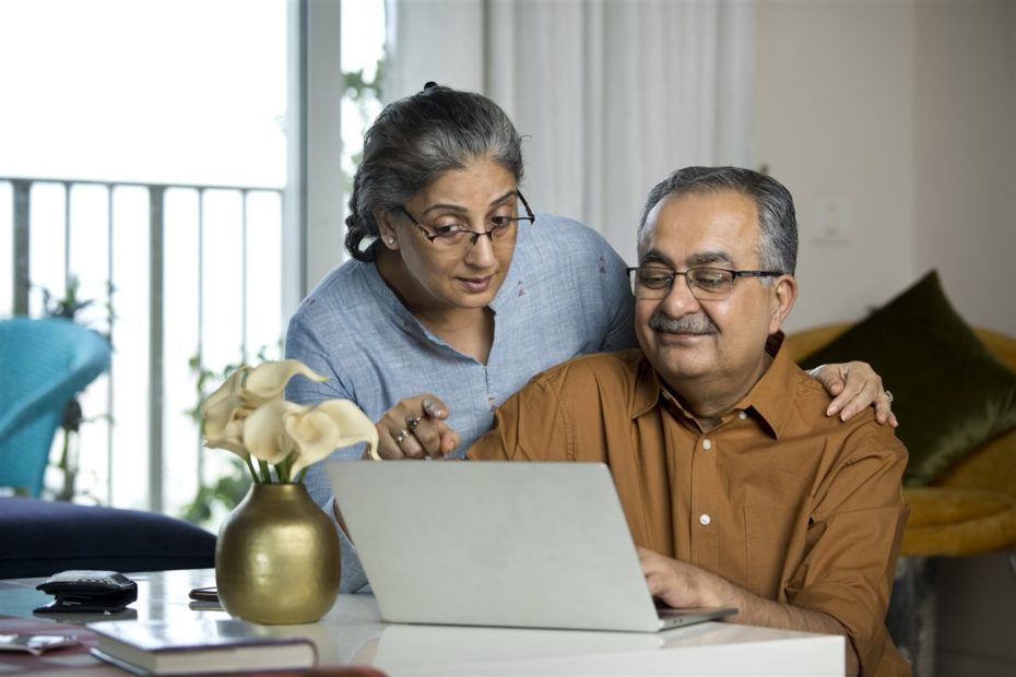 senior couple with laptop