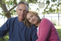 senior couple woman leaning against man