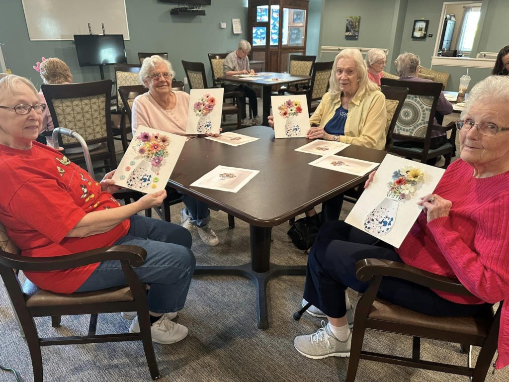 seniors at craft table