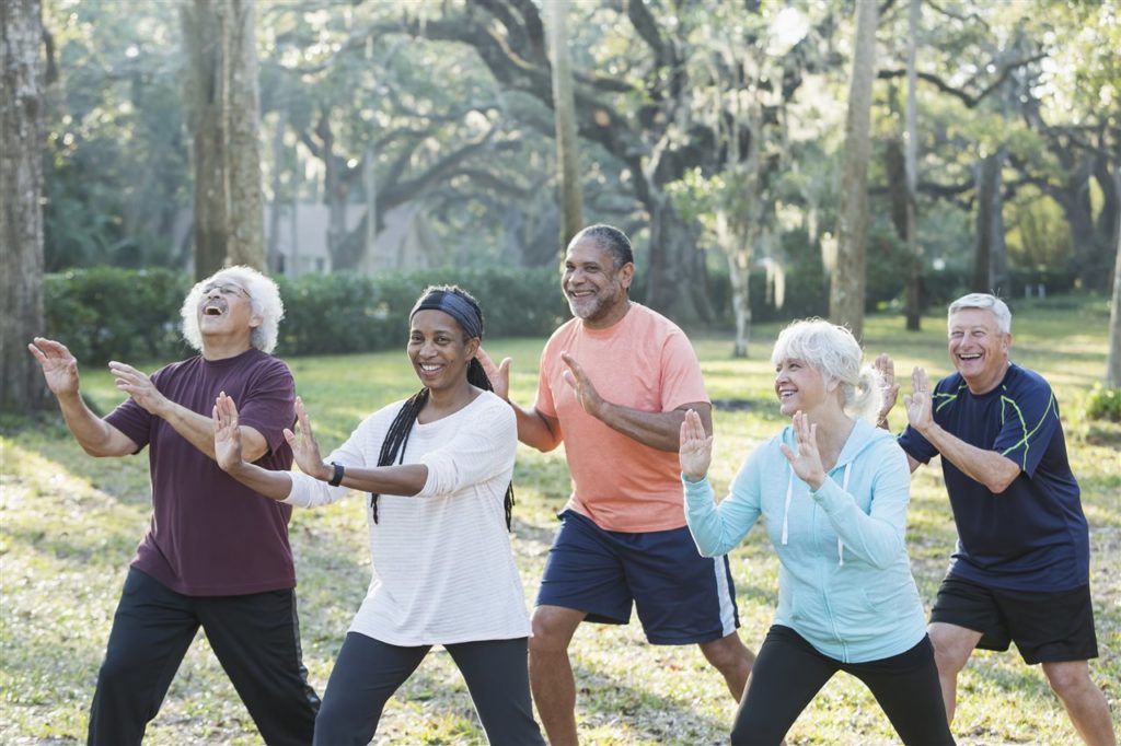 Seniors exercising outdoors